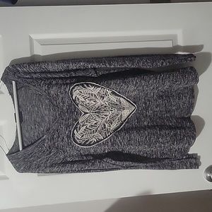 Raw edge long sleeve pullover top with lace heart applique embellishment